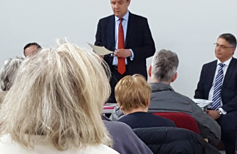 Greg Hands MP addressing his open meeting against Heathrow expansion in Fulham Library, with speakers from Heathrow Airport and NATS.