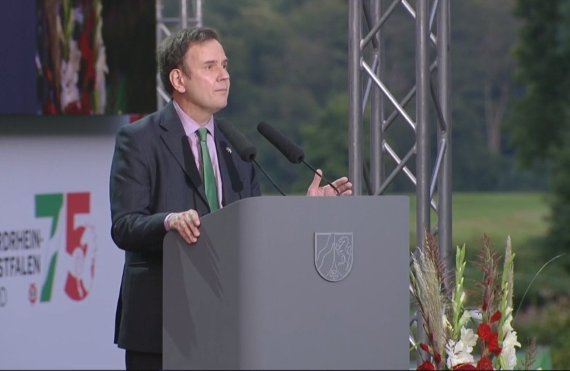 Greg Hands MP making a speech at the 75th anniversary of the foundation of the German state of North Rhine Westphalia