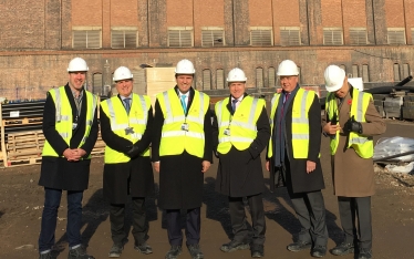 Greg Hands MP touring the site at the Chelsea Riverside development, better known as the Lots Road power station.
